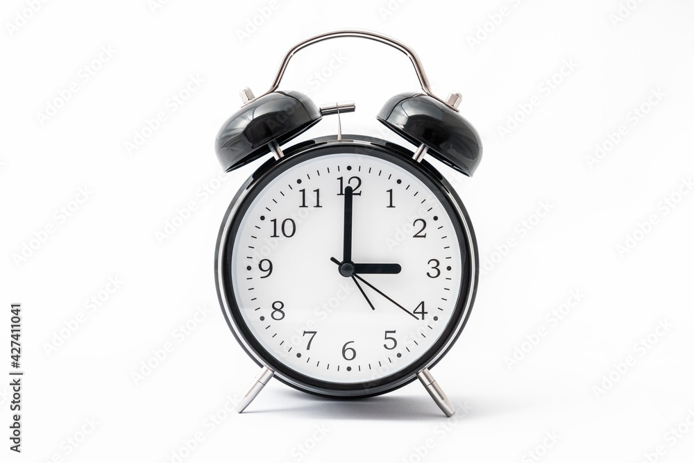 Alarm clock with double bell - winter and summer time concept Alarm clock with double bell - winter and summer time concept
