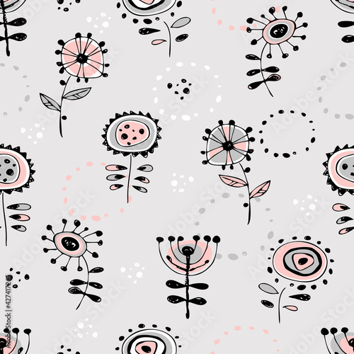 Seamless pattern with cute doodle-style flowers. Vector.