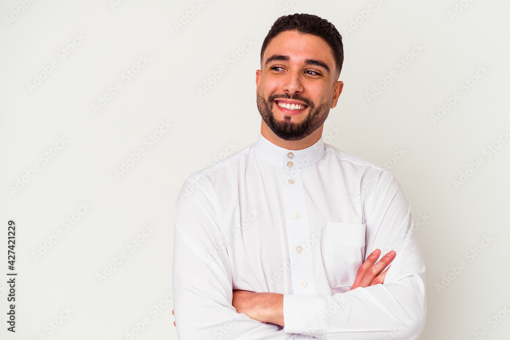 Young arab man wearing typical arab clothes isolated on white background Young arab man wearing typical arab clothes isolated on white background