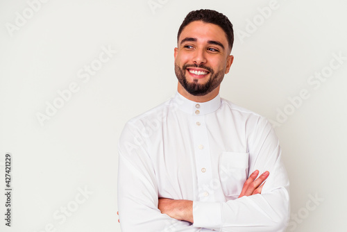 Quadro su tela Young arab man wearing typical arab clothes isolated on white background