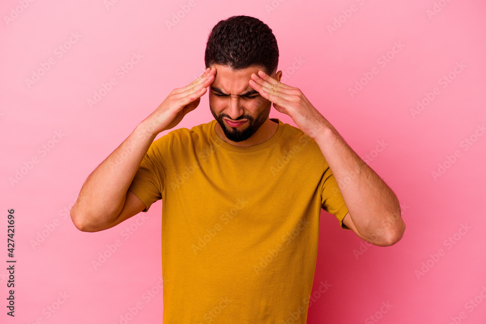 Young mixed race man isolated on pink background Young mixed race man isolated on pink background