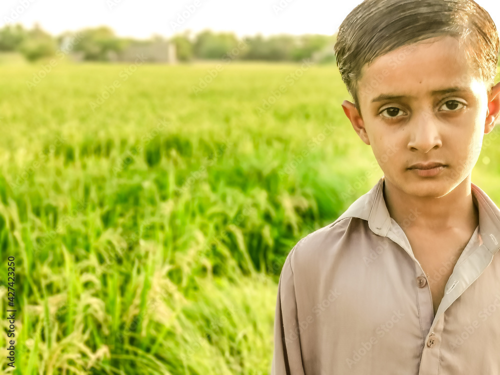 a poor staring hungry orphan boy and sad expression on his face and his face and clothes are dirty and his eyes are full of pain a poor staring hungry orphan boy and sad expression on his face and his face and clothes are dirty and his eyes are full of pain