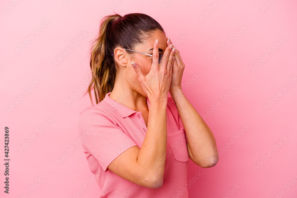 Young caucasian woman isolated on pink background Young caucasian woman isolated on pink background