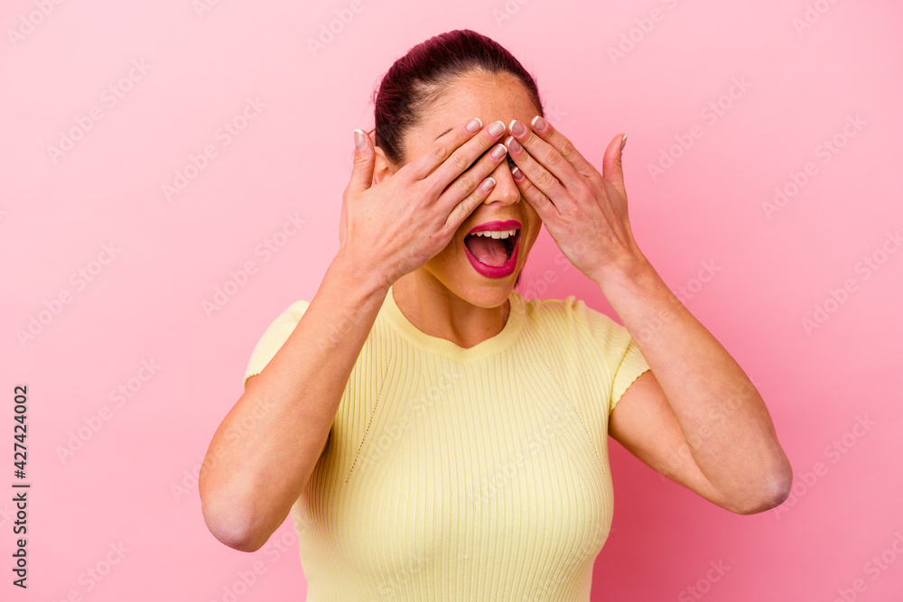Young caucasian woman isolated on pink background Young caucasian woman isolated on pink background