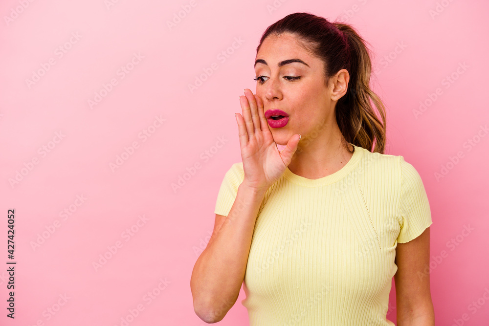 Young caucasian woman isolated on pink background Young caucasian woman isolated on pink background