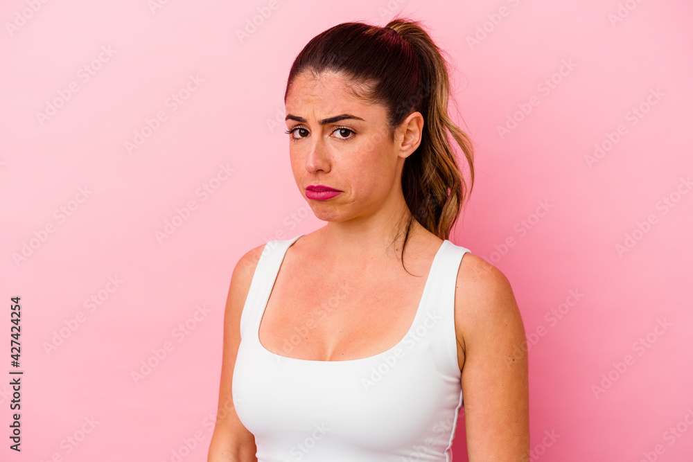 Young caucasian woman isolated on pink background Young caucasian woman isolated on pink background