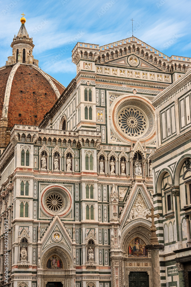 Fototapeta premium Close-up of the main facade of the Florence Cathedral, Santa Maria del Fiore, with the dome of Filippo Brunelleschi and the Baptistery of San Giovanni. UNESCO world heritage site, Tuscany, Italy, Euro