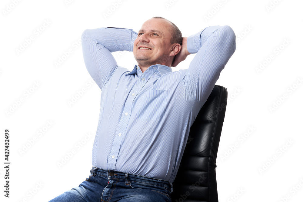 Relaxed businessman sitting in a chair Relaxed businessman sitting in a chair