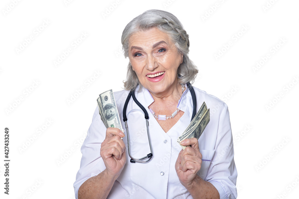 Portrait of female doctor holding money bills Portrait of female doctor holding money bills