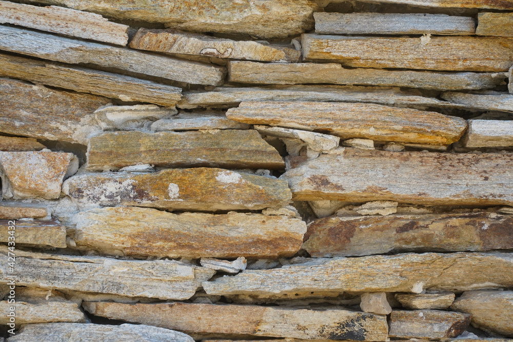 stone fence. stone texture. photo during the day. stone fence. stone texture. photo during the day.