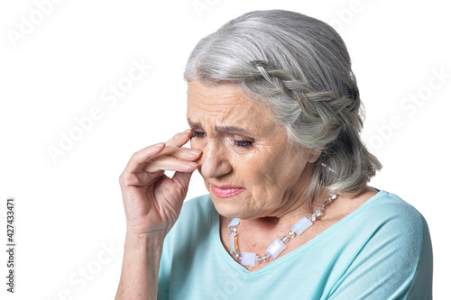 Portrait of sad senior woman crying
