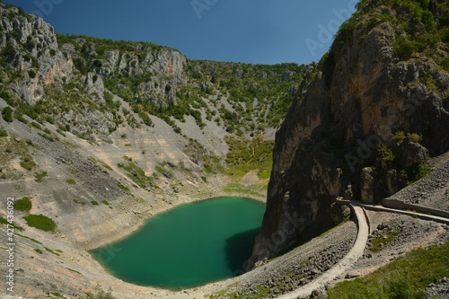 Fototapeta Naklejka Na Ścianę i Meble -  Blue Lake is a clear karst lake near Imotski in Dalmatia, Croatia