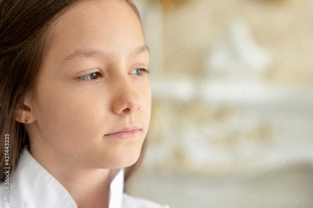 thinking girl in white blouse posing at home thinking girl in white blouse posing at home