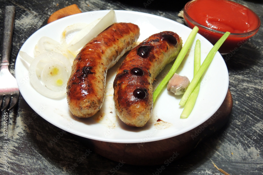 fried sausages with sauce