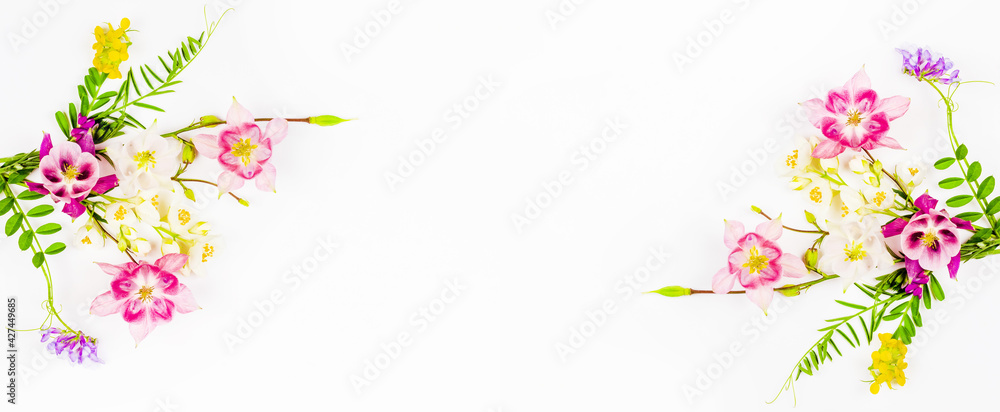 frame of a bouquets of pink flowers aquilegia, white Jasmine and green leaves on a white background with a copy space frame of a bouquets of pink flowers aquilegia, white Jasmine and green leaves on a white background with a copy space