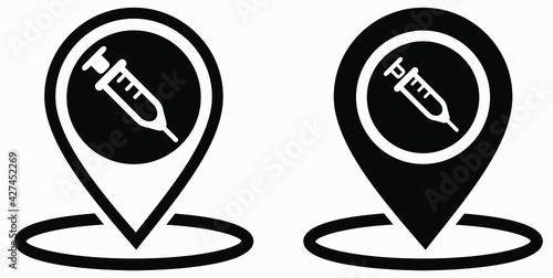 Syringe and location icon. Vaccination sign. The location of the hospital. Vector icon.