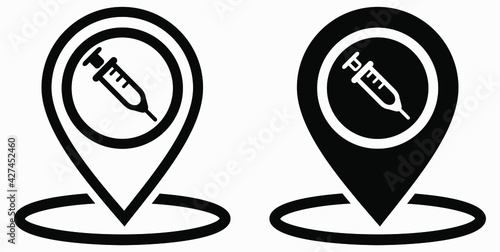 Syringe and location icon. Vaccination sign. The location of the hospital. Vector icon.