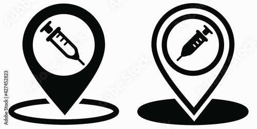 Syringe and location icon. Vaccination sign. The location of the hospital. Vector icon.