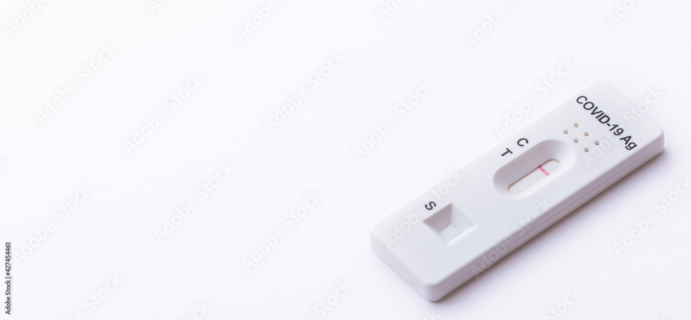 Rapid Covid-19 coronavirus strip test cassette for antibody or sars-cov-2 virus disease epidemic isolated on white background close-up Rapid Covid-19 coronavirus strip test cassette for antibody or sars-cov-2 virus disease epidemic isolated on white background close-up