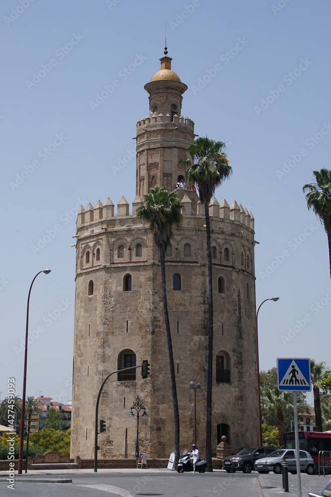 Seville landmark Golden tower of Torre del Oro on the Guadalquivir seafront, Moorish tower, built to protect the harbor of Seville in 1220