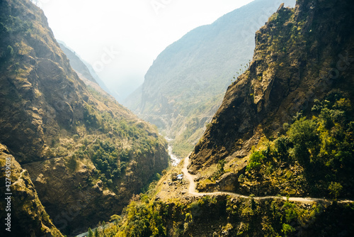 Lonely road, annapurnas trekking road, in Himalayas, Nepal photo