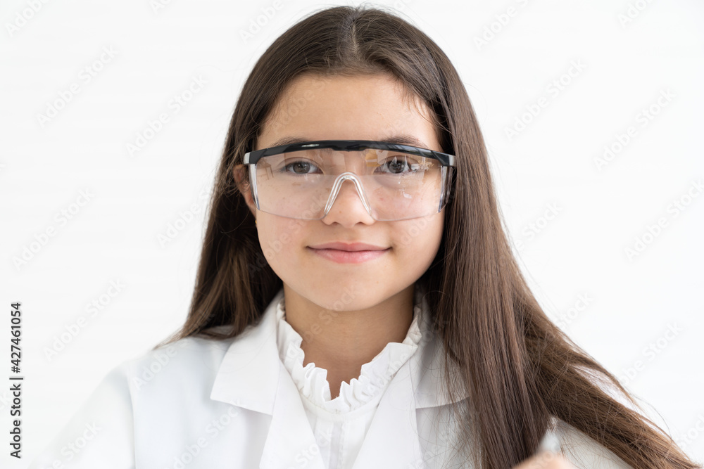 Child girl scientists wearing glasses learning and doing analysis for germs with glassware in the laboratory. Scientific experiment. Early development of children. Research and development concept Child girl scientists wearing glasses learning and doing analysis for germs with glassware in the laboratory. Scientific experiment. Early development of children. Research and development concept