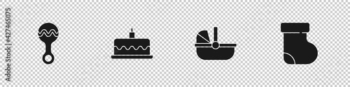 Set Rattle baby toy, Cake with burning candles, Baby stroller and socks clothes icon. Vector