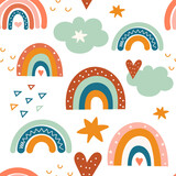 Boho seamless pattern with rainbows and clouds. Vector illustration.