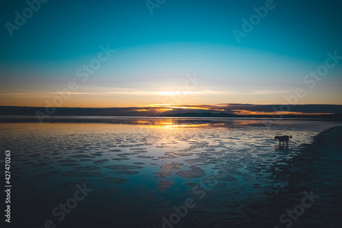 Dawn at the beach on Sandymount strand in Dublin, Ireland. 