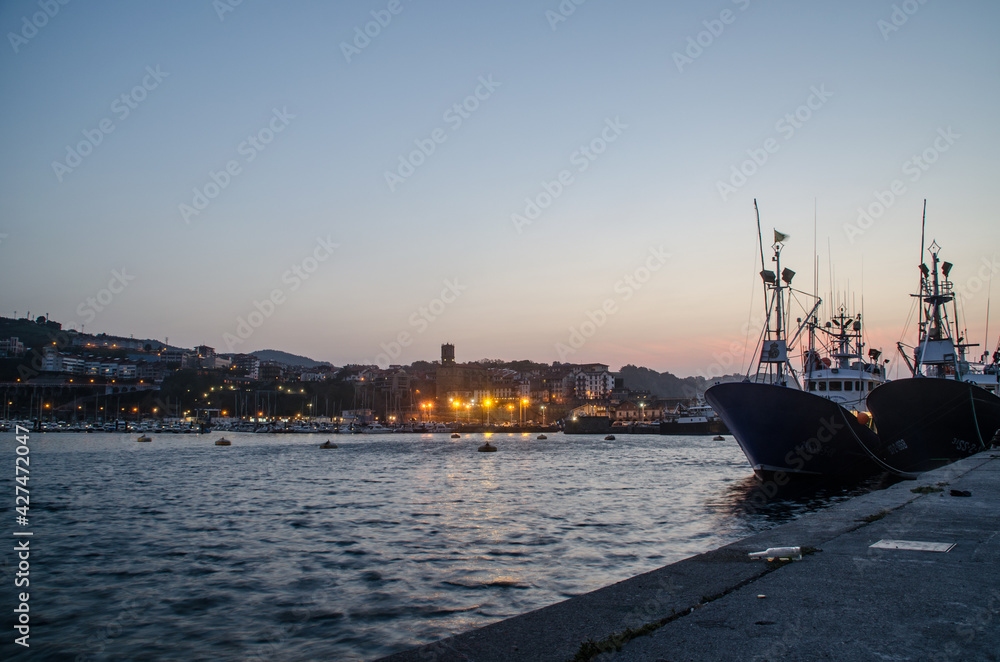 fishing boats moored in the port of Guetaria, Spain