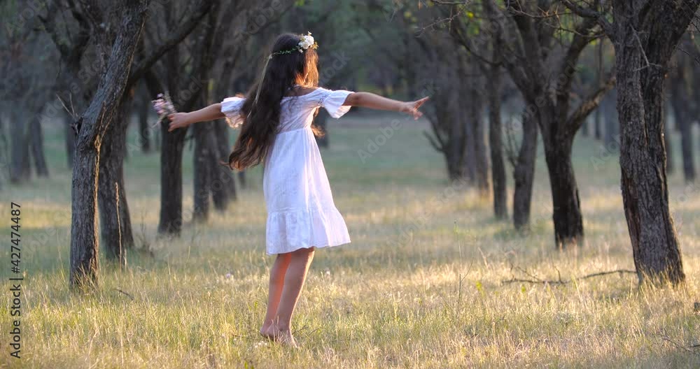 Pretty Caucasian teenager girl with long brown hair and blue eyes in a ...