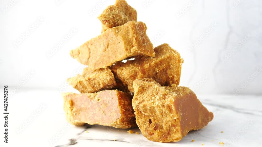stack of Jaggery traditional cane sugar cube on table stack of Jaggery traditional cane sugar cube on table