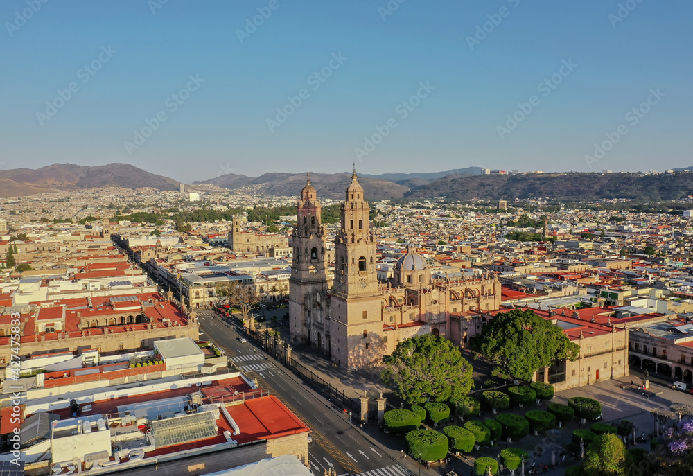 Aerial photos made with drone from downtown Morelia, Michoacán Mexico. Sky view of Catedral de Morelia made at sunset.