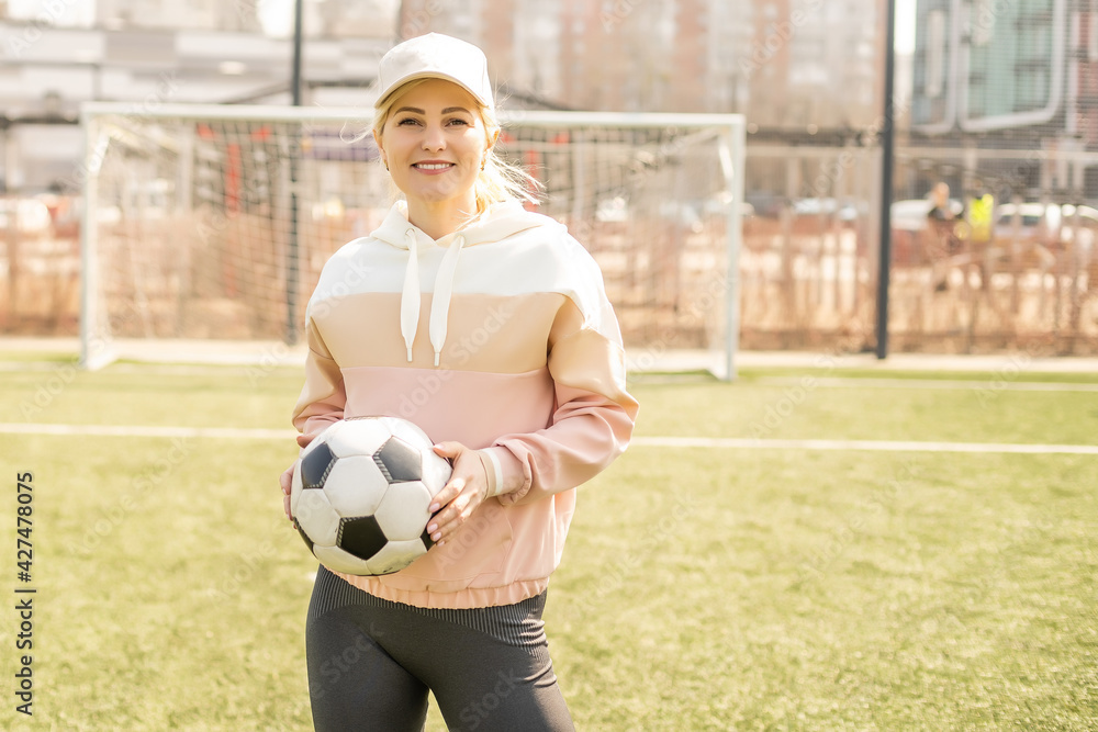 sexy fitness woman in sportswear. athletic lady warming up on stadium running track. female athlete do sport workout. trainer or coach training. perfect body shape. healthy and sporty sexy fitness woman in sportswear. athletic lady warming up on stadium running track. female athlete do sport workout. trainer or coach training. perfect body shape. healthy and sporty