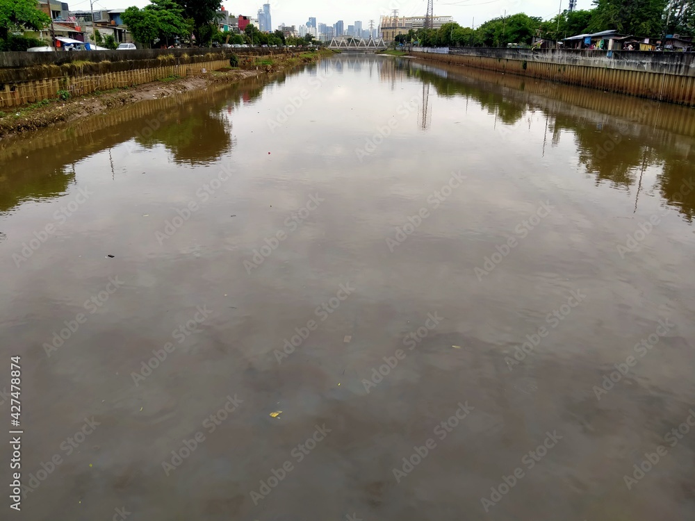 The atmosphere of the dirty black river often floods The atmosphere of the dirty black river often floods