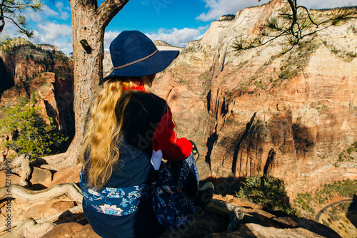 girl traveller with a hat on Zion National Park in southwestern Utah near the town of Springdale, USA photo