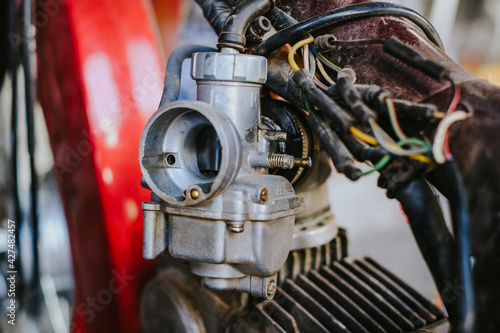 Carburetors on modified motorcycle engines.