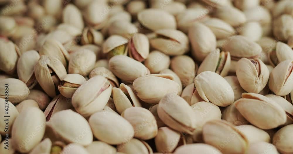 Toasted mouth-watering pistachios. Slider shot Toasted mouth-watering pistachios. Slider shot