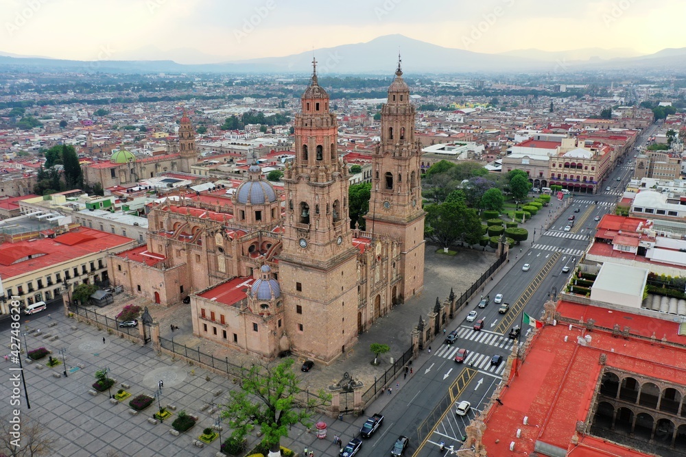 Fototapeta premium Aerial photo of Catedral de Morelia, located at city downtown. Drone photos at sunset of Morelia City.