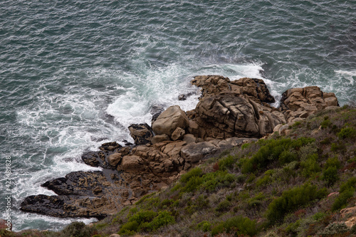 waves crashing on rocks