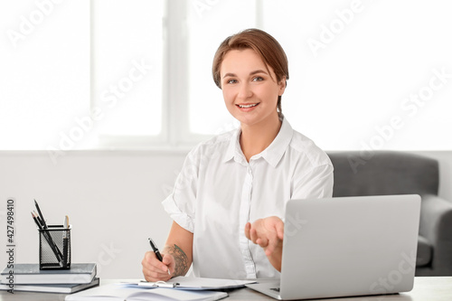 Female psychologist working...