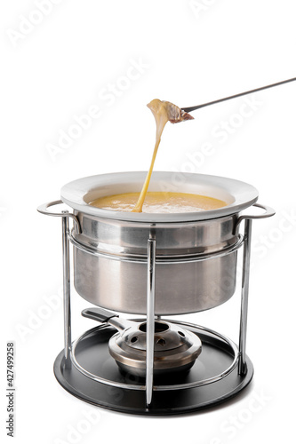 Stick with crouton dipped into cheese fondue on white background
