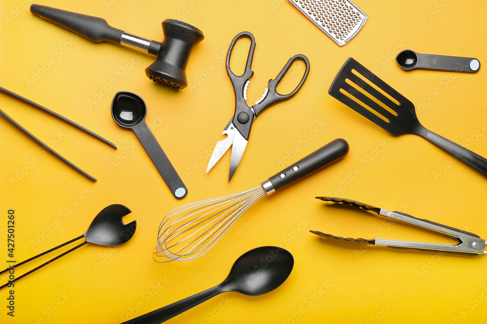Set of kitchen utensils on color background Set of kitchen utensils on color background