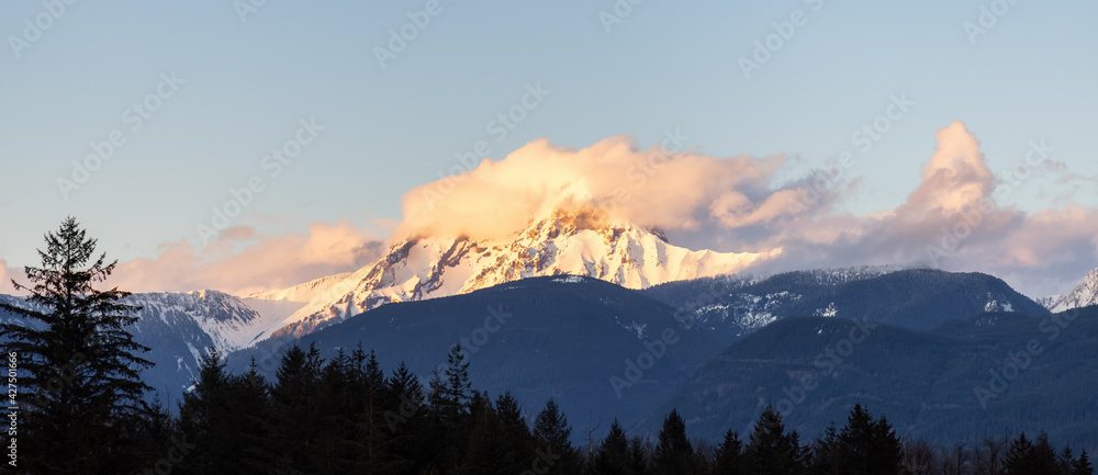 Panoramic View of Canadian Mountain Landscape covered in Clouds. Colorful Sunset Sky. Mt Garibaldi in Squamish, British Columbia, Canada. Nature Background Panorama