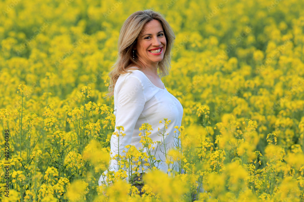 woman portrait with yellow flowers field background woman portrait with yellow flowers field background