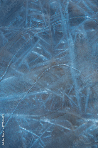 Ice structure. Abstract illustration in blue tones. Background, texture of frozen water. Frosty drawing on the window © dewessa