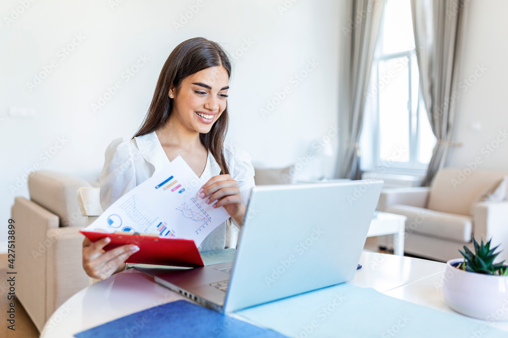 Focused businesswoman presenting charts and graphs on video call online. Young business woman having conference call with client on laptop. Closeup business woman working laptop computer indoor. Focused businesswoman presenting charts and graphs on video call online. Young business woman having conference call with client on laptop. Closeup business woman working laptop computer indoor.