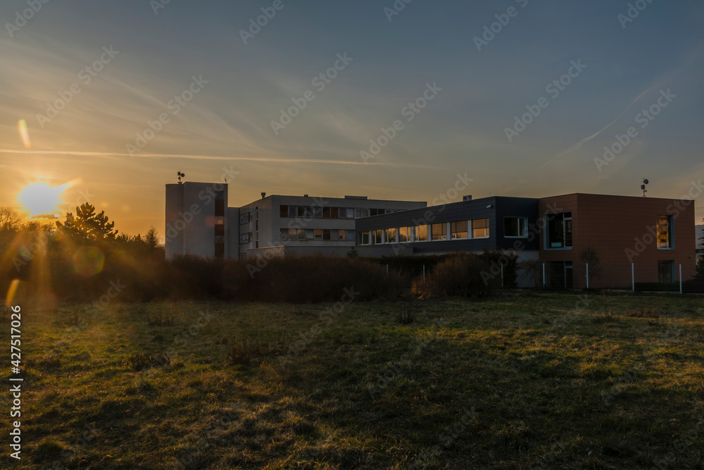 Sunset in housing estate in Usti nad Labem city with big house Hotelak