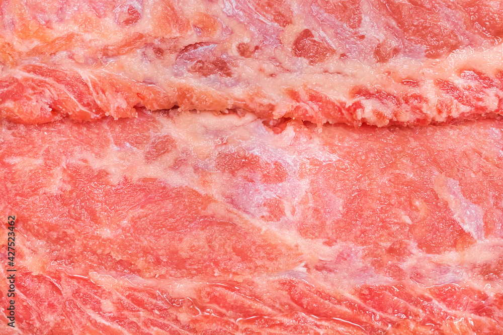 Raw red meat ambassador, pork neck background, close-up Raw red meat ambassador, pork neck background, close-up