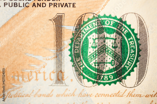 Macro shot of a 100 dollar. Dollars Closeup Concept. American Dollars Cash Money. One Hundred Dollar Banknotes.